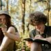 Teenagers explore nature and study outdoors, enjoying a fun and educational adventure., tags: freizeit bildung und - pexel